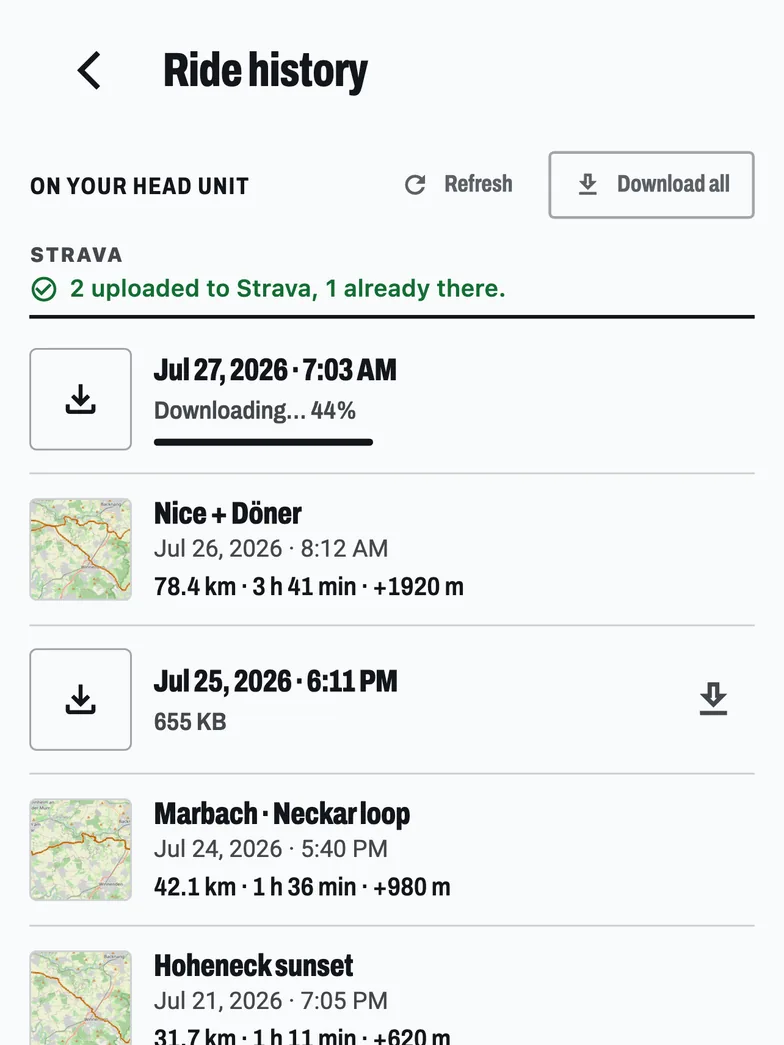 Ride history: rides still on the bike computer with a Download all button, and a note that two went up to Strava and one was already there.